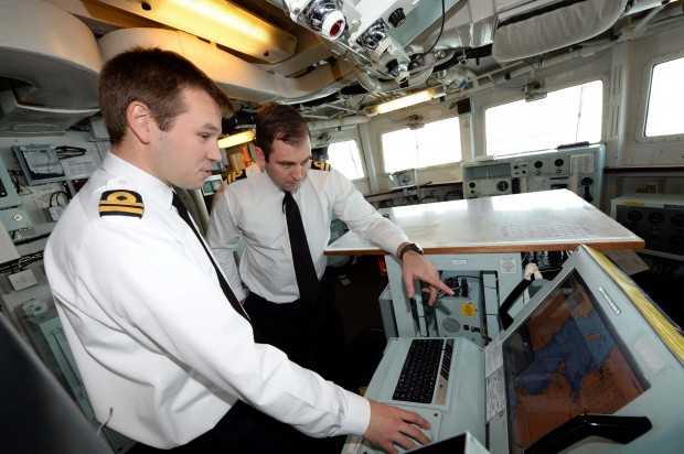 Lieutenant Costley-White (left) uses the electronic charts with Lieutenant McKenna HMS Kent © Royal Navy 